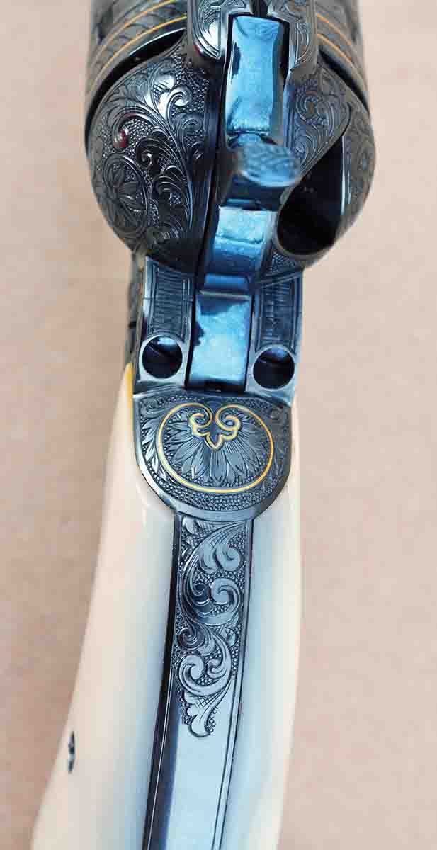 Even the tiniest of details of the original Sears, Roebuck & Company Colt Single Action Army revolver were duplicated to  perfection, including engraving pattern and gold inlay. The engraving by Dennis Kies is finer and more precise than the original.